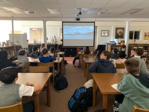 Students watching The Letter